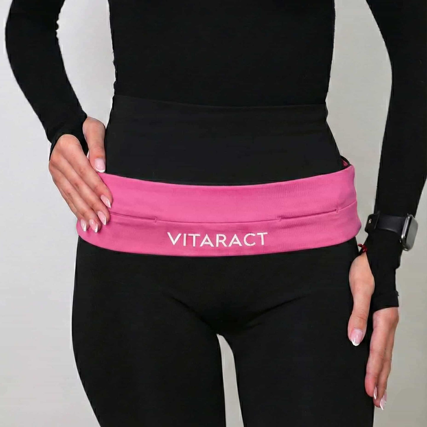 Vitaract pink running belt for women — bounce-free waistband with smartwatch, Lebanon