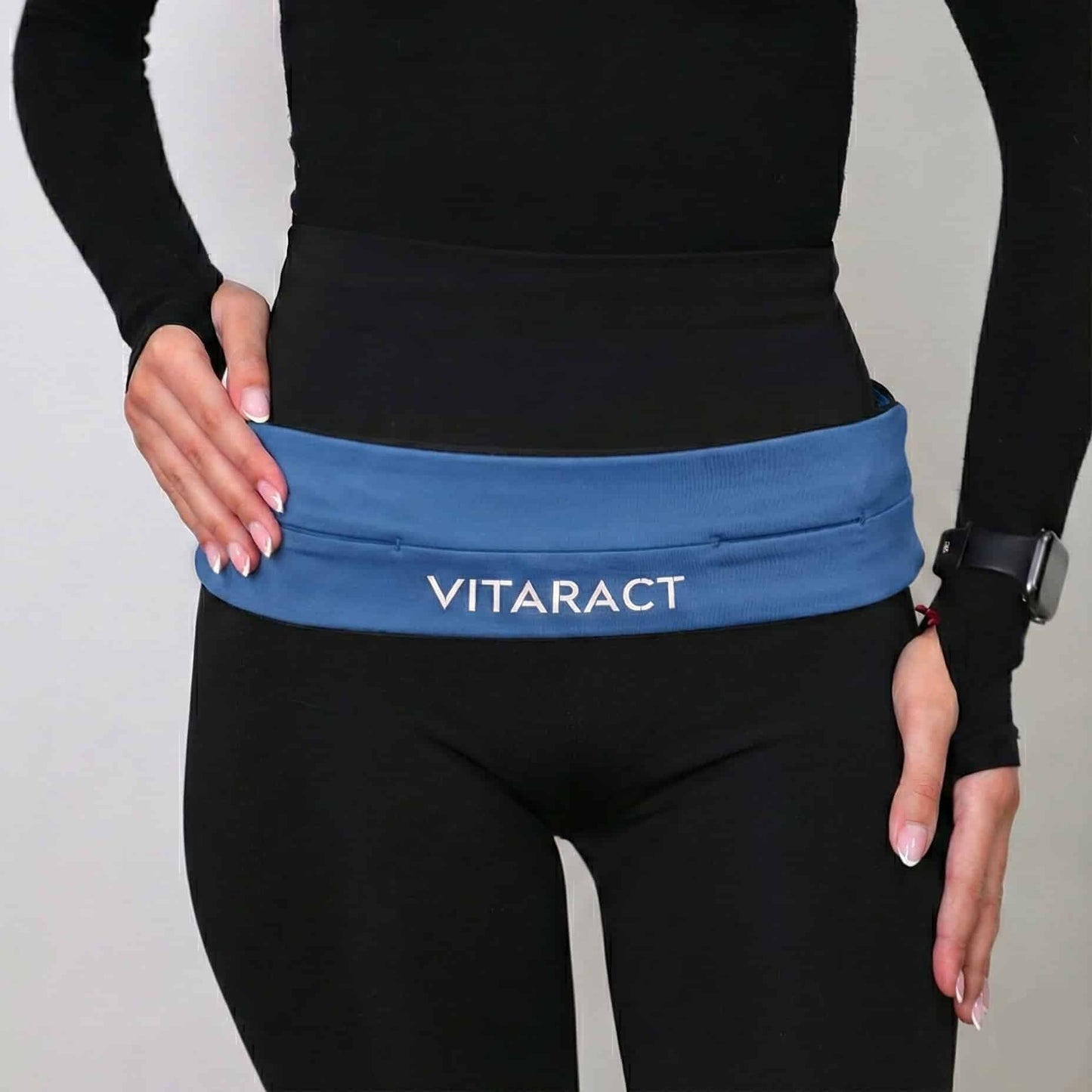 Vitaract bounce-free running belt holding iPhone Pro Max and keys lebanon