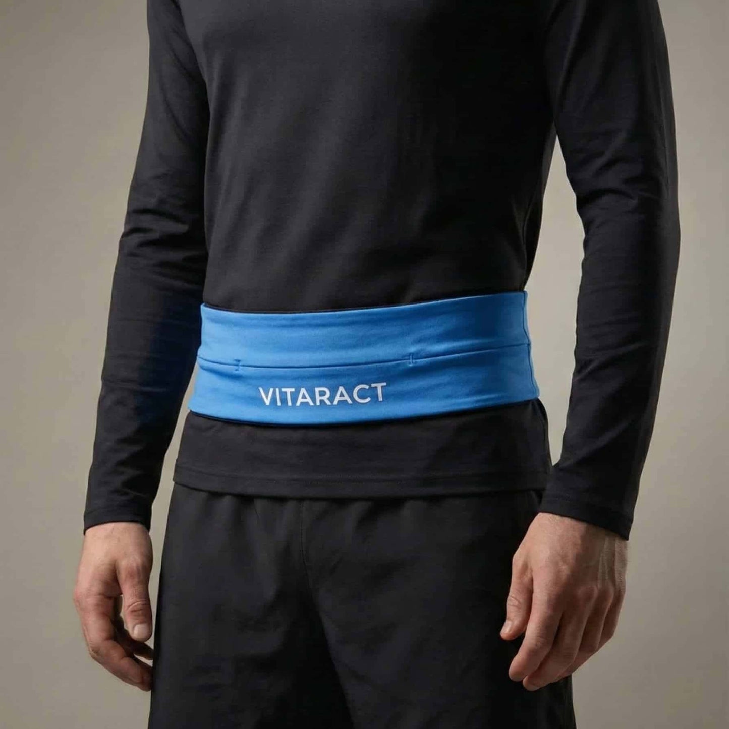 Vitaract bounce-free running belt holding iPhone Pro Max and keys lebanon